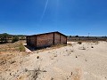 27,000m2 of land with wooden cabin in Inland Villas Spain