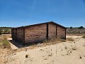 27,000m2 of land with wooden cabin in Inland Villas Spain